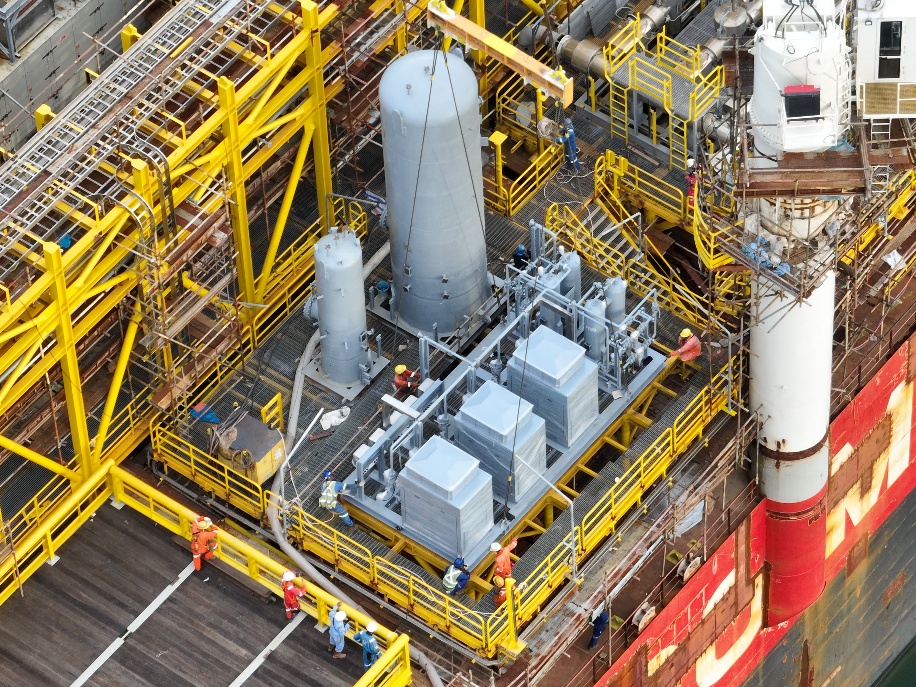 Air compressor package installed on an offshore facility